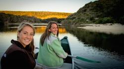 2 Women Enjoying a Boat Ride