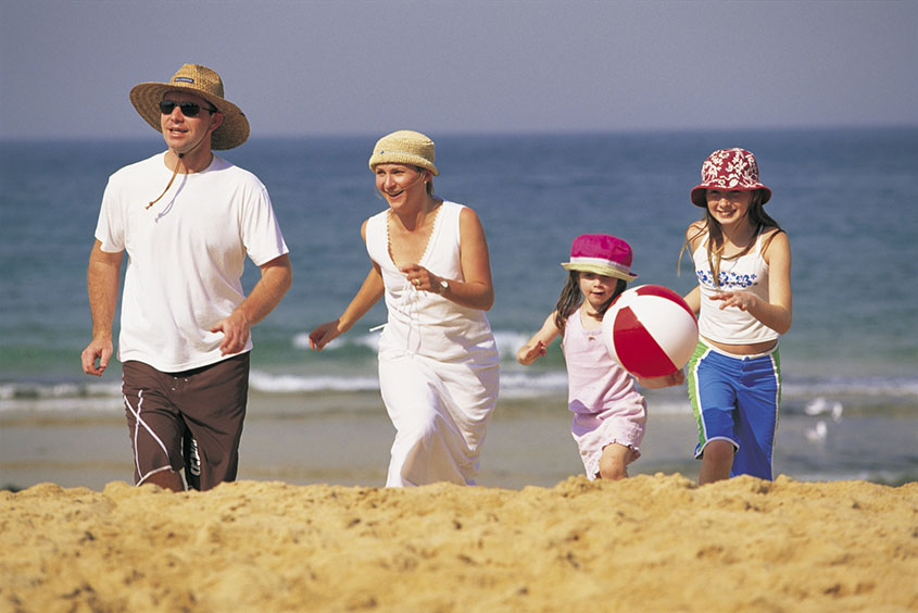 Family playing on Terrigal Beach